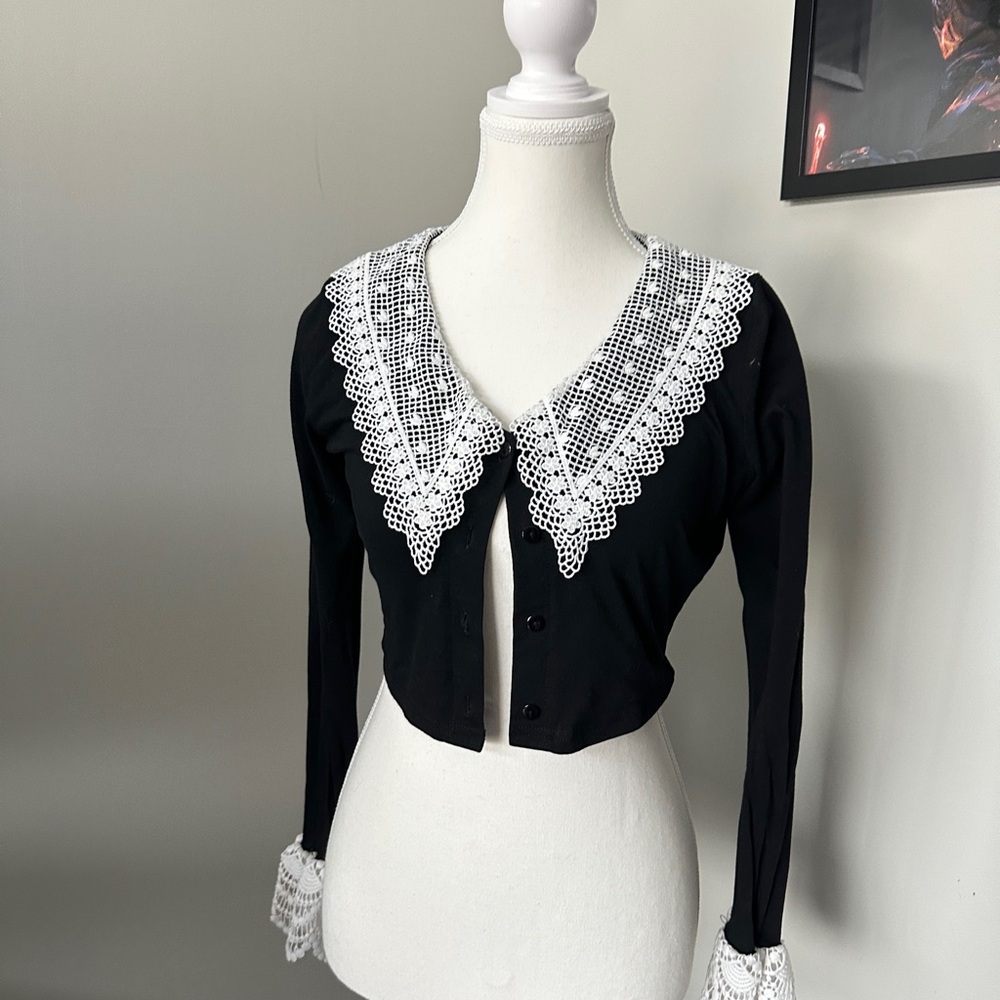 Black long sleeve crop blouse with embellished bib collar
